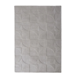 Origins Penny Cream rug with a warm cream tone and carved circular wool texture.
