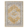 “Elegant cream and gold patterned rug adding warmth to a contemporary home interior.”
