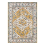 “Elegant cream and gold patterned rug adding warmth to a contemporary home interior.”
