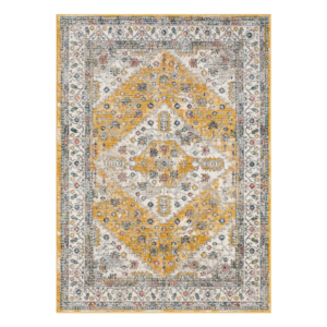 “Elegant cream and gold patterned rug adding warmth to a contemporary home interior.”