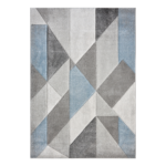 Orbit Alto rug with layered blue tones and a soft textured pattern, styled in a modern interior.