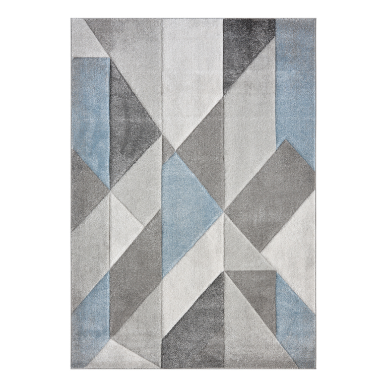 Orbit Alto rug with layered blue tones and a soft textured pattern, styled in a modern interior.