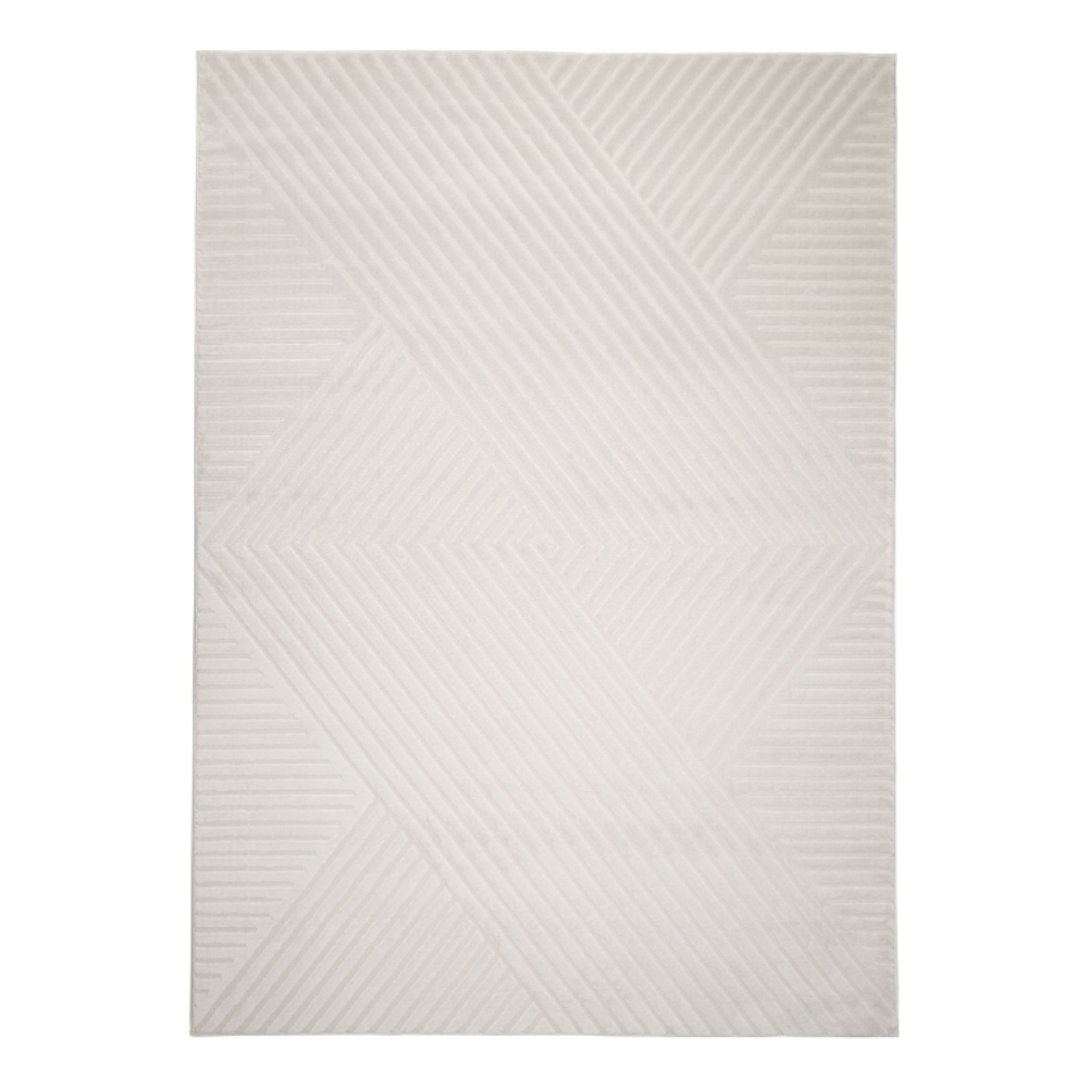 dark charcoal rug featuring raised diamond motifs and layered grey shading
