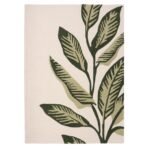 Origins Paradise Leaf rug with oversized green leaf motif and hand‑carved wool texture on an ivory background.