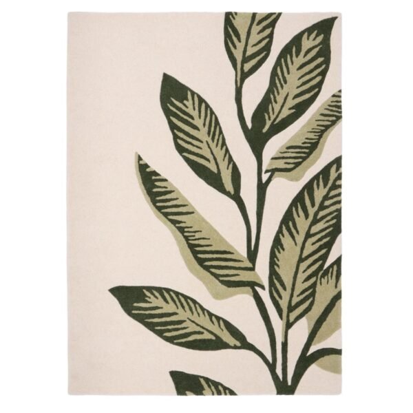 Origins Paradise Leaf rug with oversized green leaf motif and hand‑carved wool texture on an ivory background.
