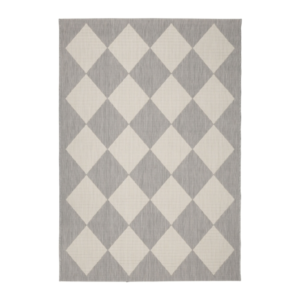 beige indoor outdoor rug featuring a soft geometric diamond design