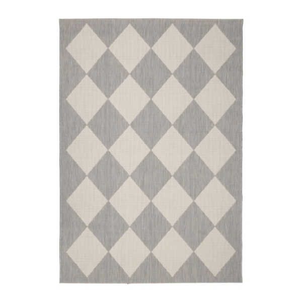 beige indoor outdoor rug featuring a soft geometric diamond design