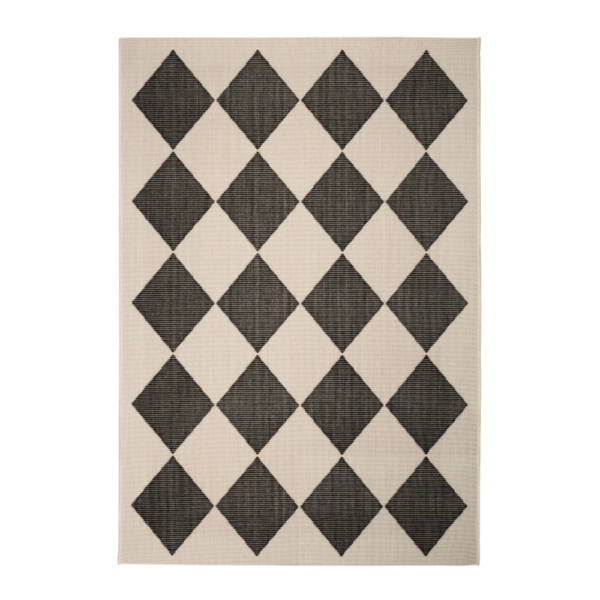 monochrome indoor outdoor rug featuring a striking geometric diamond design