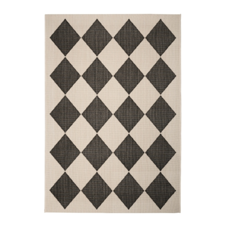 monochrome indoor outdoor rug featuring a striking geometric diamond design