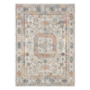 “Neutral cream‑beige rug featuring a gentle, understated pattern styled in a cosy living space.”