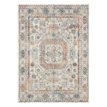 “Neutral cream‑beige rug featuring a gentle, understated pattern styled in a cosy living space.”