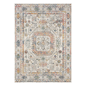 “Neutral cream‑beige rug featuring a gentle, understated pattern styled in a cosy living space.”