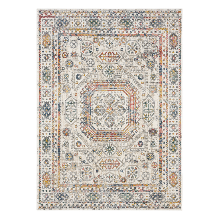 “Neutral cream‑beige rug featuring a gentle, understated pattern styled in a cosy living space.”