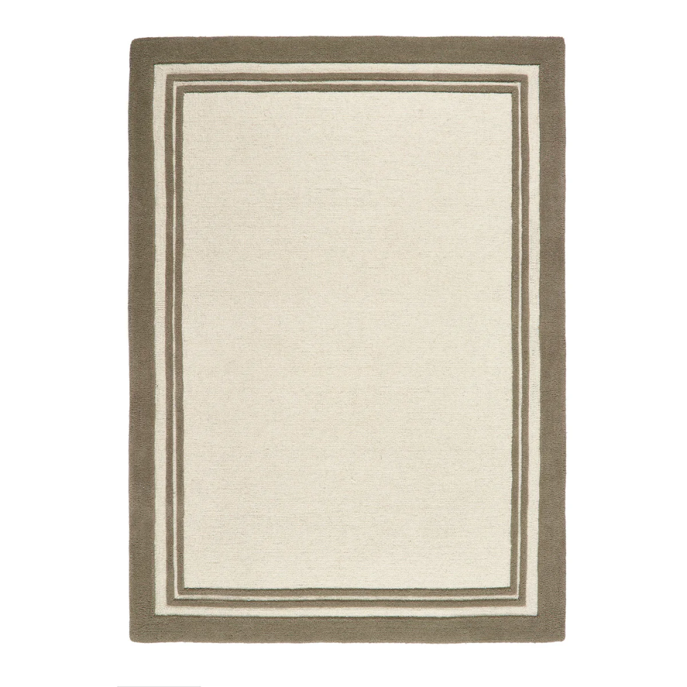 Piper Monochrome rug featuring a bold black border around a soft cream wool centre.