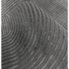 Textured charcoal rug showing soft curved arches and a bold sculpted finish