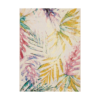 tropical indoor outdoor rug with bold leaf pattern